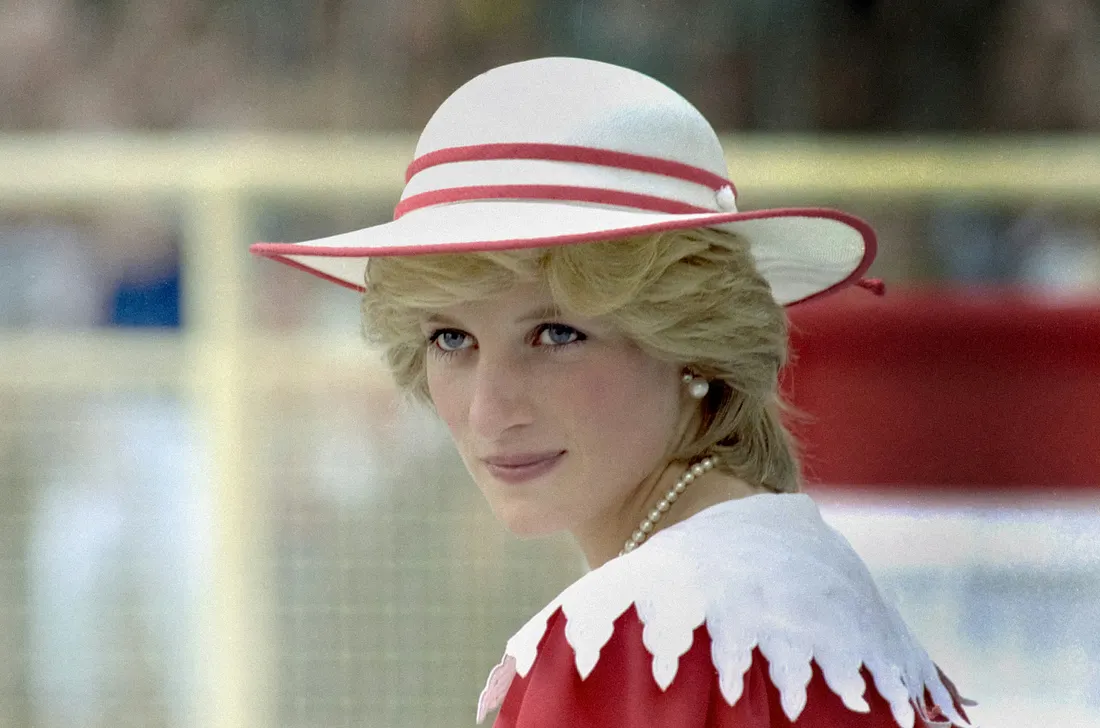 Princess Diana in a white and red outfit