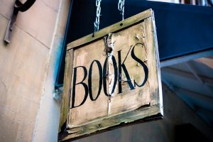 A sign that says Books on it