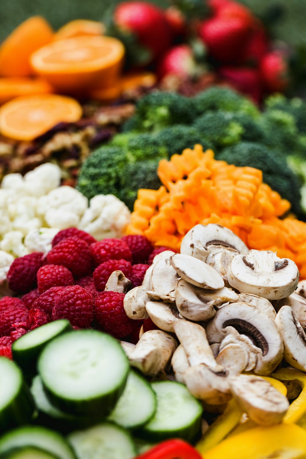 Lots of healthy fruits and vegetables, cucumbers, mushrooms, broccoli, berries and cauliflower. 